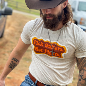 Pick Guitars, Not Fights. T-Shirt
